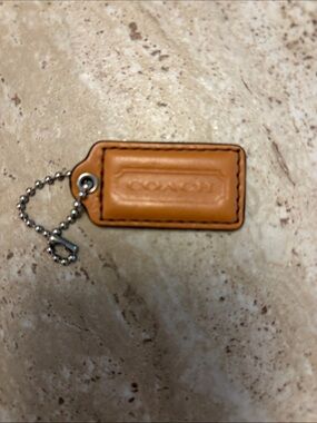 COACH Saddle Tan Leather Bag Tag - Classic Leather Bag Tag/Keychain